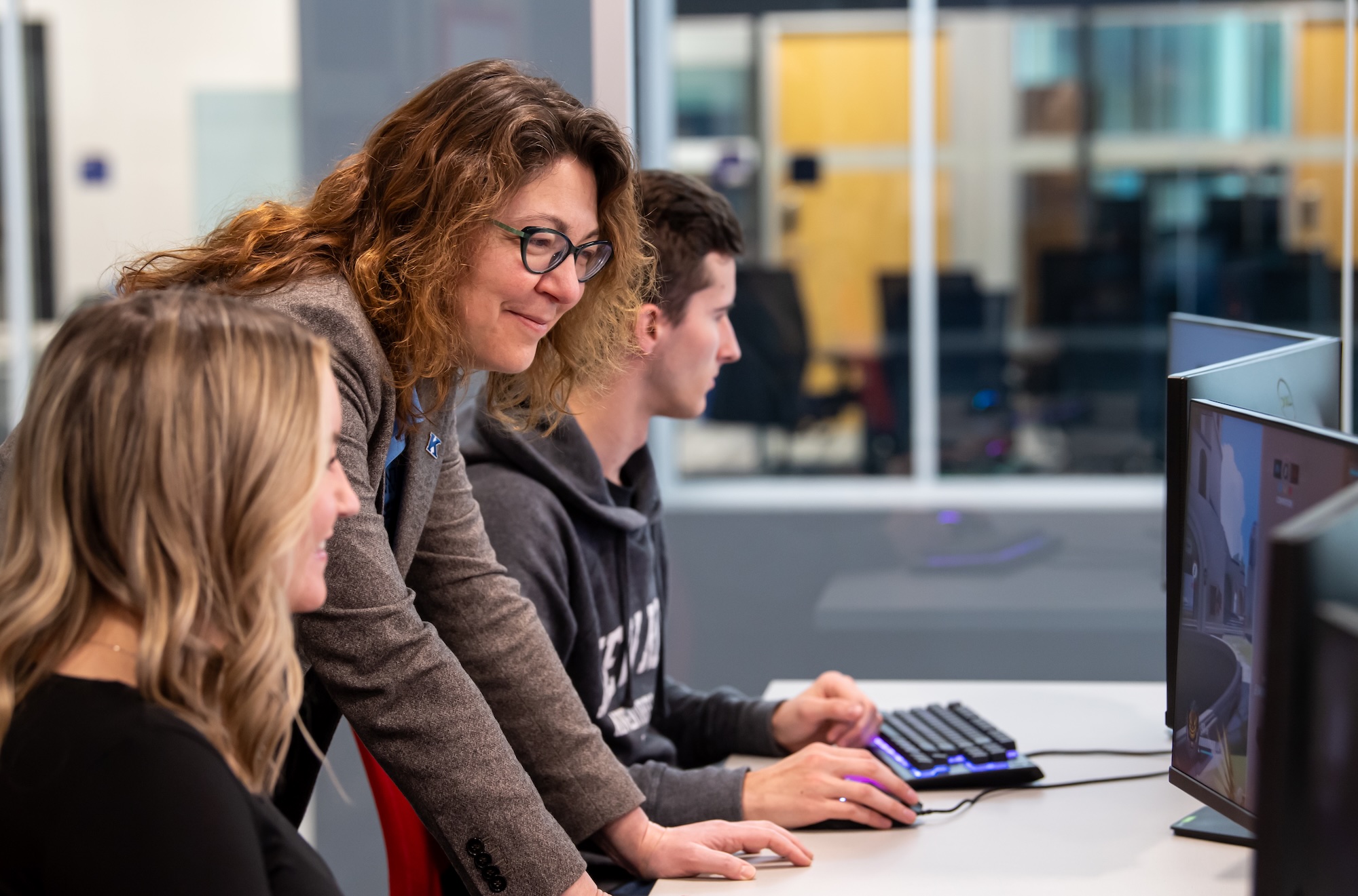 Faculty member works with students at Kent State University