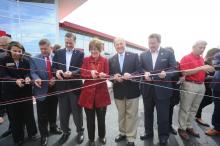 Officials celebrate the opening of The Point