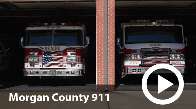 Fire engines parked in a station.